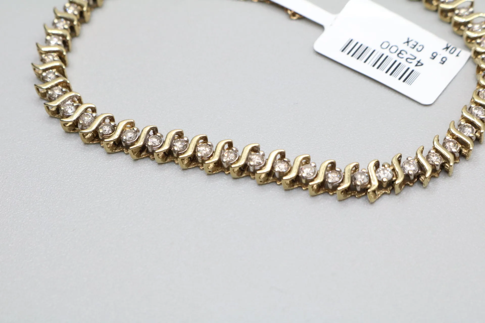 10K Yellow Gold Diamond Tennis Bracelet (1.47 CTW) (Length 4.5")