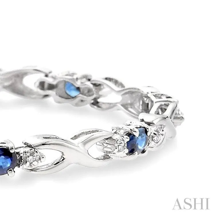 4x3 MM Oval Cut Sapphire and 1/10 Ctw Single Cut Diamond Bracelet in 10K White Gold