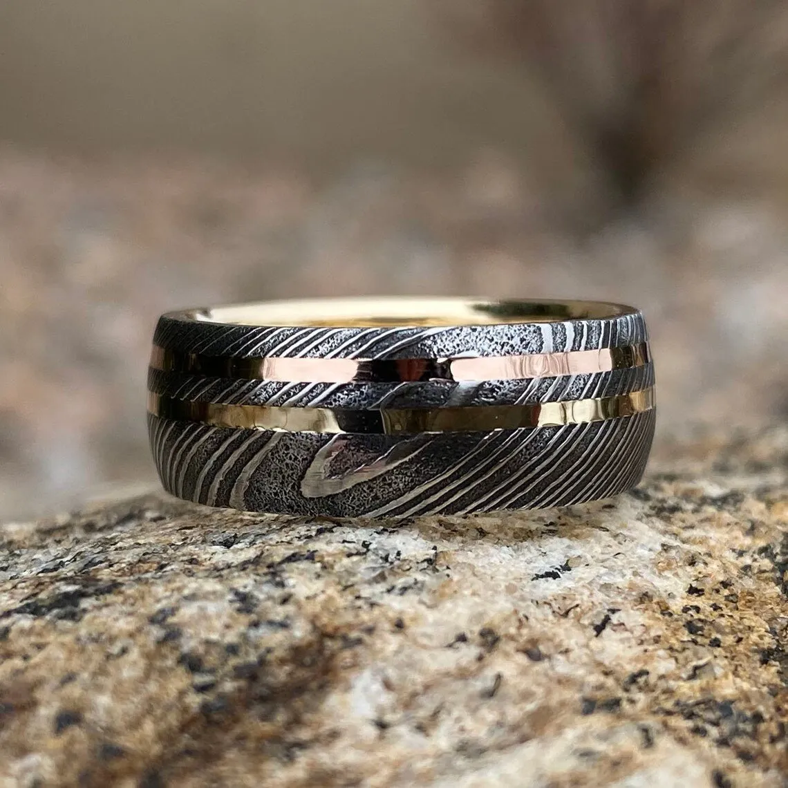 8mm Wide Damascus Steel Ring with Dual 14k Rose & Yellow Gold Off Center Grooves and a 14k Solid Gold Sleeve