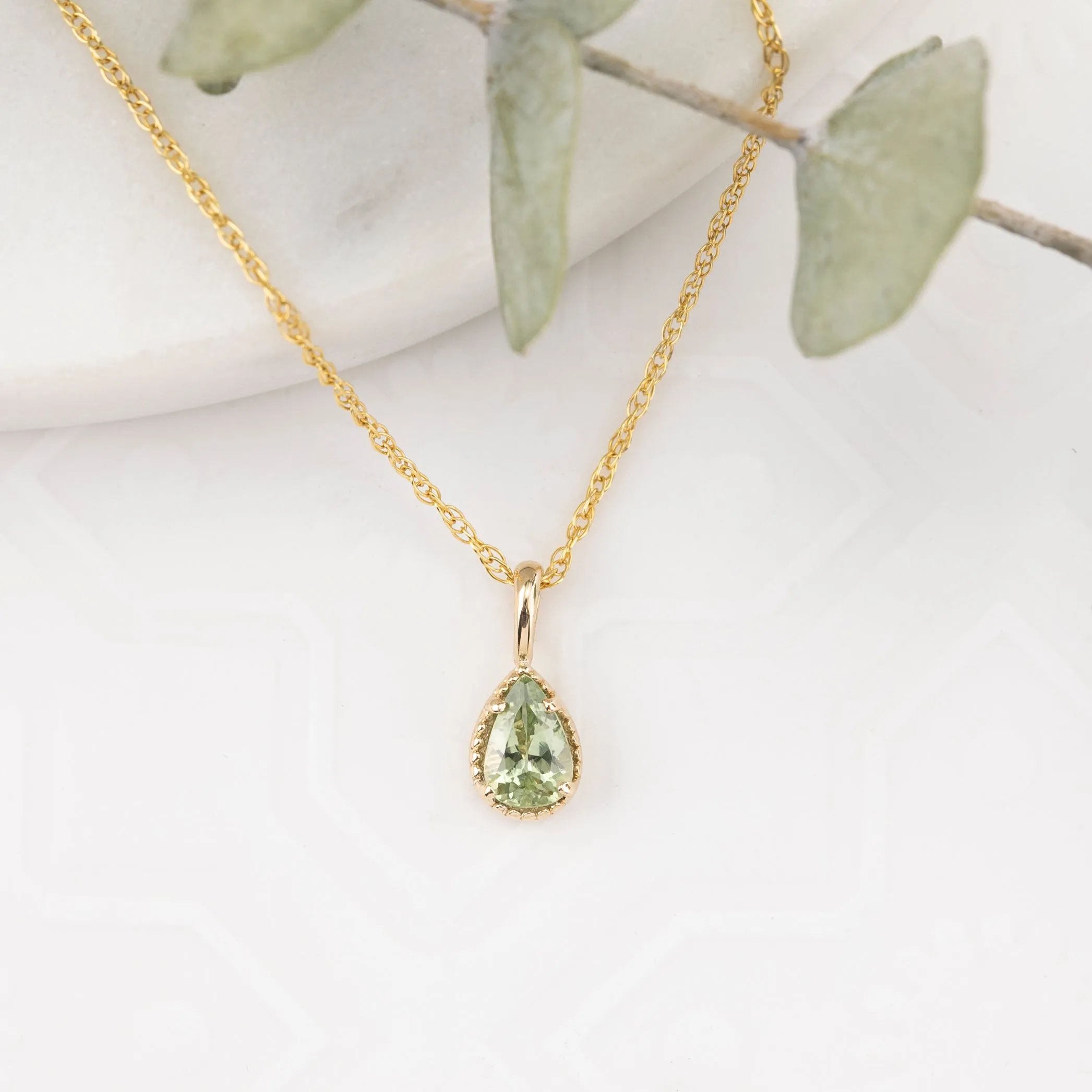 Dahlia Sapphire Pear Solitaire Necklace