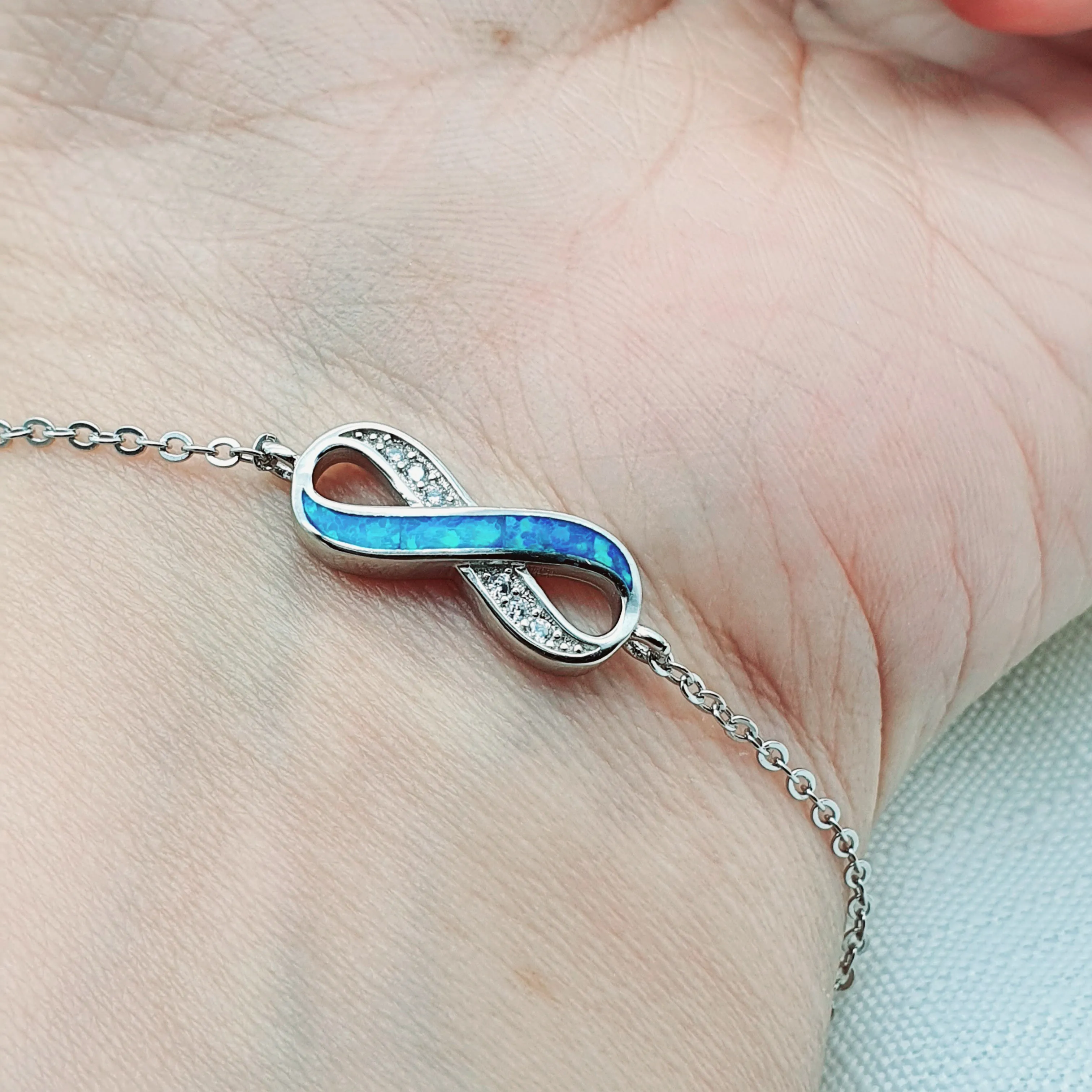 Infinity Blue Fire Opal Bracelet, Sterling Silver