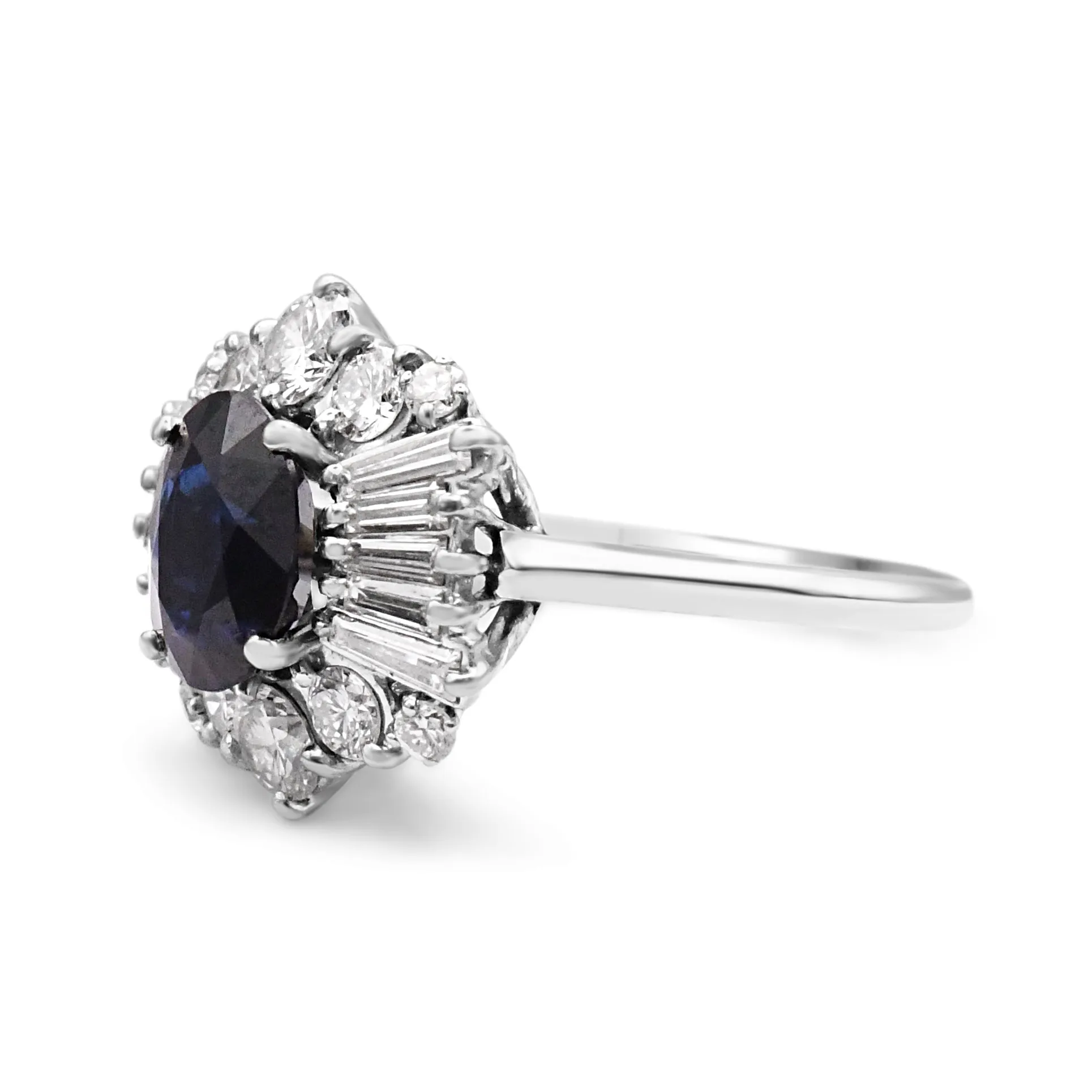 Oval Sapphire And Brilliant & Baguette Diamond Cluster Ring